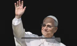 Pope Leo XIV greets pilgrims gathered in St. Peter's Square at the Vatican for the Angelus on December 14, 2025. / Vatican Media