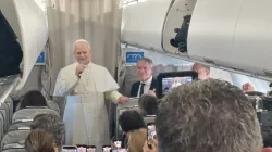 Pope Leo XIV talks to reporters during his flight to Lebanon on Nov. 30, 2025. / Credit: Elias Turk/EWTN News