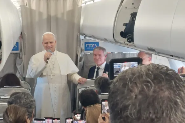 Pope Leo XIV talks to reporters during his flight to Lebanon on Nov. 30, 2025. / Credit: Elias Turk/EWTN News
