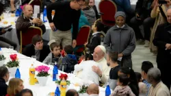 Pope Francis receives a hug from a child during lunch on the World Day of the Poor Nov. 13, 2022. | Daniel Ibáñez / CNA