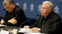 Cardinal Jean-Claude Hollerich (right), relator general of Synod on Synodality, speaks to the media on June 20, 2023, at the temporary headquarters of the Holy See Press Office in Vatican City. Beside him is Cardinal Mario Grech, the Secretary General for the Synod of Bishops. | Daniel Ibáñez/CNA