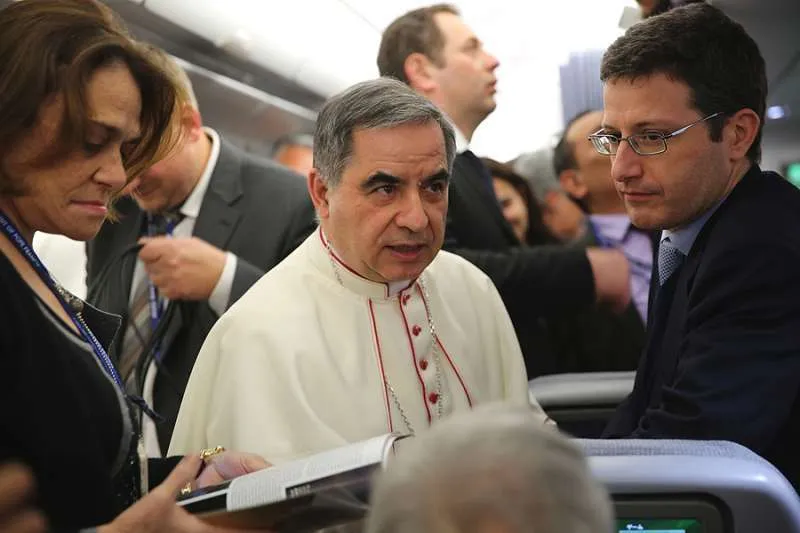 Cardinal Giovanni Angelo Becciu, center, in 2015. Credit: Alan Holdren/CNA.