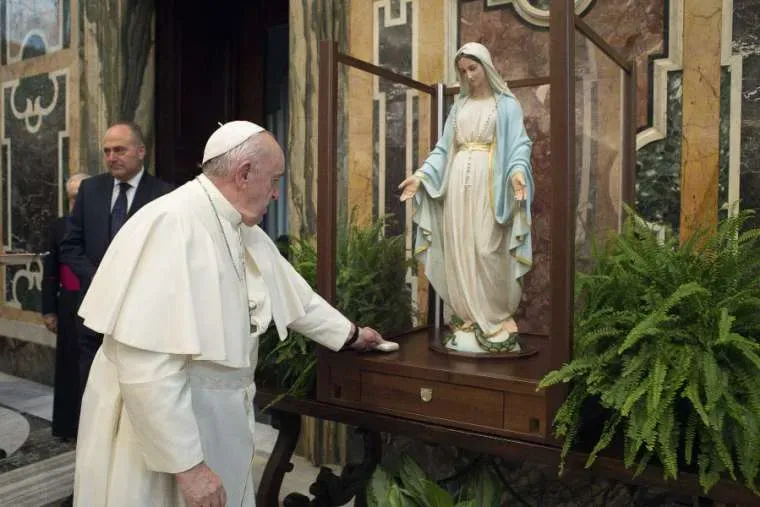 Pope Francis blesses a statue of the Immaculate Virgin Mary of the Miraculous Medal Nov. 11, 2020. Credit: Vatican Media. null
