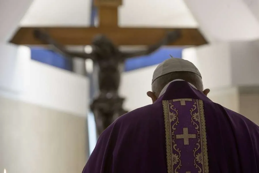 Pope Francis stands in front of the crucifix in the chapel of the Casa Santa Marta April 4, 2020. Credit: Vatican Media.