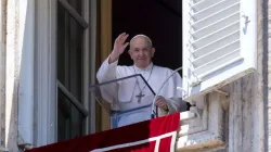 Pope Francis waves from his window overlooking St. Peter’s Square during an Angelus address. Credit: Vatican Media.