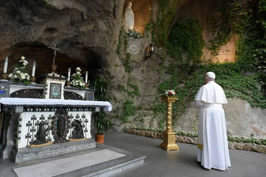 Pope Francis prays at the Lourdes Grotto in the Vatican Gardens May 30, 2020. Credit: Vatican Media