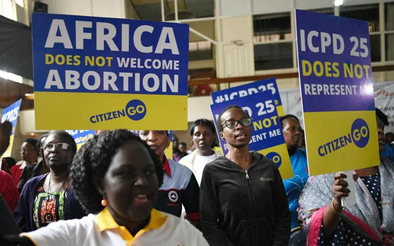Anti-abortion, and pro-family activists hold placards during a prayer rally organized by CitizenGo in Nairobi, on November 14, 2019 / The Heritage Foundation