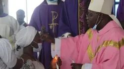 Archbishop Ignatius Kaigama administers the sacrament of confirmation at St. John Mary Vianney Parish in his Archdiocese of Abuja. / Facebook Page Abuja Archdiocese.