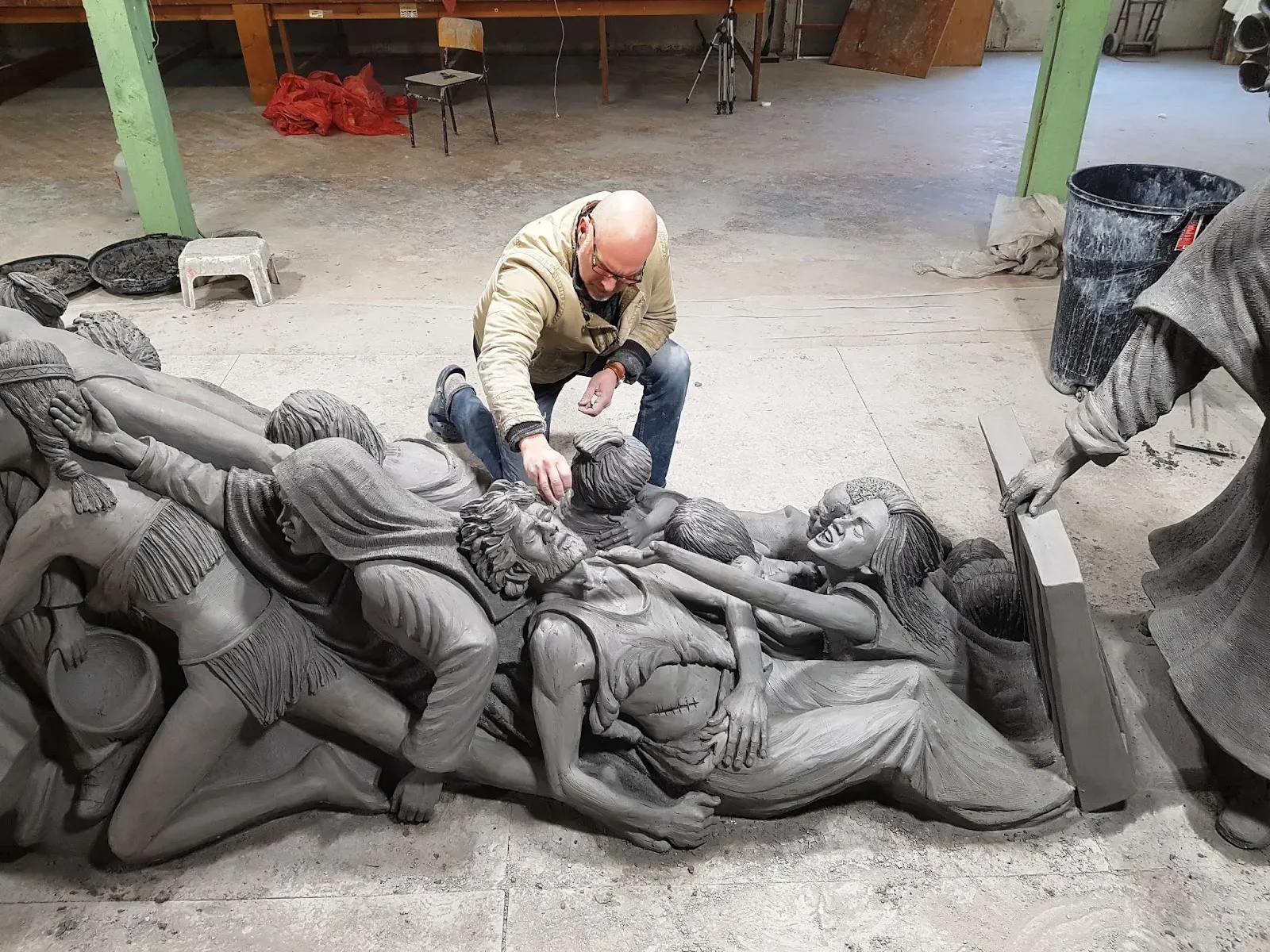 Timothy P. Schmalz with his sculpture ‘Let the Oppressed Go Free.’. Courtesy of Timothy P. Schmalz.