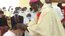 Bishop David Kamau lays hands on one of the Deacons during the ordination Mass at St Joseph and Mary Shauri Moyo parish of the Archdiocese of Nairobi, Sunday, October 25. / St. Joseph's Missionary Society/Capuchin Tv