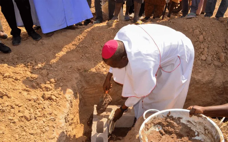 Diocese of Yola Bishop, Stephen Dami Mamza laying foundation for construction of eighty six housing units for internally displaced persons (IDPs) in Maiduguri, Northern Nigeria on Monday, January 27. / Courtesy