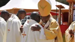 Fr. Michael Mithamo King’ori embraces Archbishop Anthony Muheria during the January 14 Ordination Mass. Credit: Nyeri Archdiocese