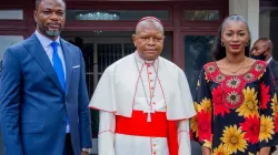 Fridolin Cardinal Ambongo (center) with DRC’s newly appointed Education Minister, Tony Mwaba (left), and his deputy, Aminata Namasia (right) after the May 11 audience in Kinshasa. Credit: Archdiocese of Kinshasa.
