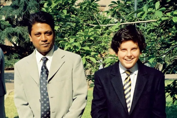 Rajesh Mohur pictured with Carlo Acutis on the day of his Confirmation | Photo courtesy of Ignatius Press