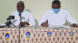 Fr. Emmanuel Wohi Nin (left) Secretary-General of the Episcopal Conference of Ivory Coast (CECCI) presenting the Pastoral Letter of the Bishops on Reconciliation, Justice, and Peace, at a press conference Tuesday, July 21.