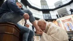 Pope Francis kisses prisoners’ feet at Rome’s Regina Coeli Prison. March 29, 2018. Vatican Media.
