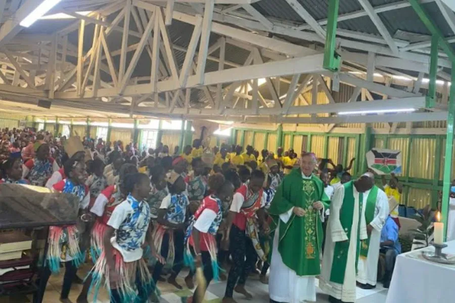 Bishop John Patrick Dolan of the Catholic Diocese of Phoenix joins a dance by members of Pontifical Missionary Childhood at St Mary's Catholic Church of the Archdiocese of Nairobi. Credit: ACI Africa