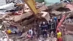 Rescuers dig through rubble of the collapsed building in the Ndogbong neighborhood in Douala. Credit: ACI Africa