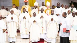Peter Kodwo Appiah Cardinal Turkson, Archbishop José Avelino Bettencourt, Archbishop Samuel Kleda and the five priests ordained on 24 February. Credit: ACI Africa