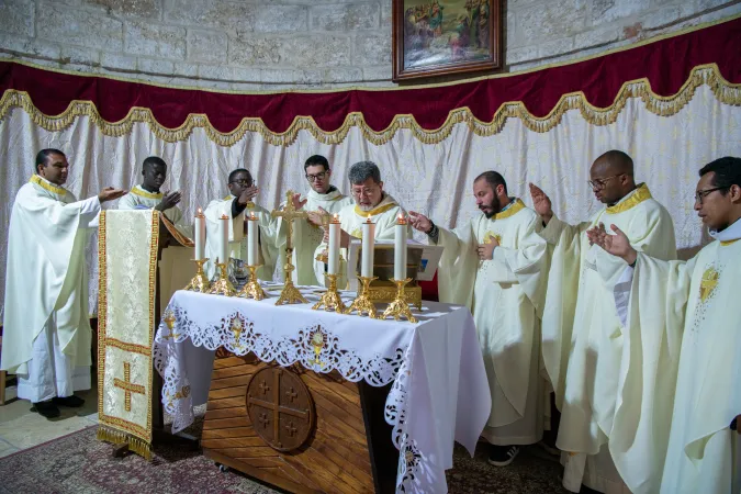 A group of priests during the celebration of the Ascension Mass inside the Chapel of the Ascension on the Mount of Olives in Jerusalem, during the night between May 8 and 9, 2024.