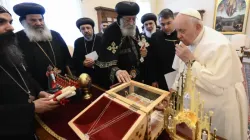 Pope Francis receives relics of the Coptic martyrs from Pope Tawadros II, the head of the Coptic Orthodox Church of Alexandria, May 11, 2023. Pope Francis also announced that the 21 men will be added to the Church’s official list of saints. | Credit: Vatican Media