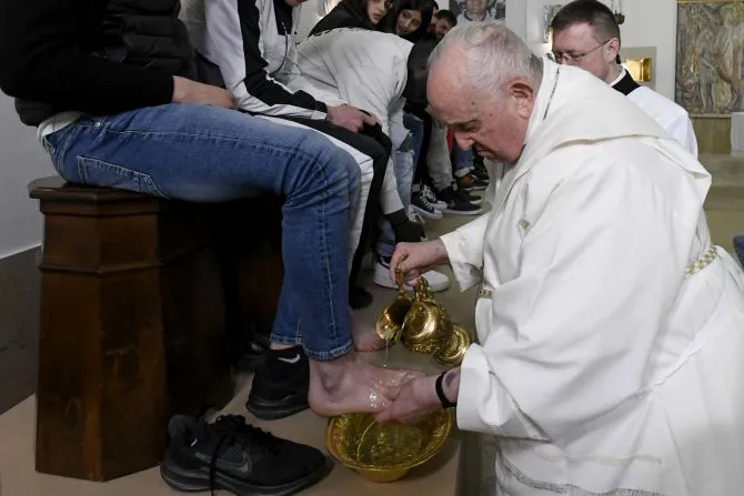 Pope Francis washes the feet of 12 young men and women, inmates at Casal del Marmo juvenile detention center on Rome’s outskirts, during a Mass of the Lord’s Supper on Thursday, April 6, 2023. | Credit: Vatican Media