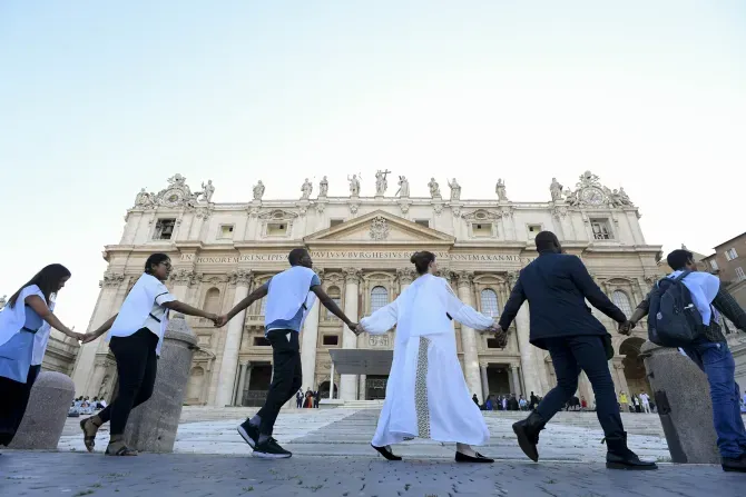 Young people from around the world held hands in St. Peter's Square during the #NotAlone human fraternity event June 10, 2023. | Vatican Media