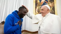 Pope Francis meets with Pato, a migrant from Cameroun who lost his wife Matyla and child Marie in the desert between Libya and Tunisia last July. Credit: Vatican Media