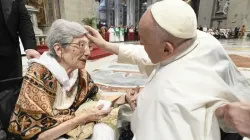 Pope Francis blesses a woman in St. Peter's Basilica, where he presided over a special papal Mass on July 23, 2023, marking the third annual World Day for Grandparents and the Elderly. | Vatican Media