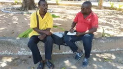 Hilário Tomas (left) one of the nine radio journalists recounting the attack on several villages in the Muidumbe District within Pemba Diocese. / FORCOM Facebook Page