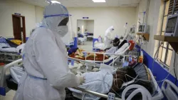 Health workers attend to COVID-19 patients in the intensive care unit of an isolation and treatment center for those with COVID-19 in Machakos, South of the capital Nairobi, in Kenya. / AP