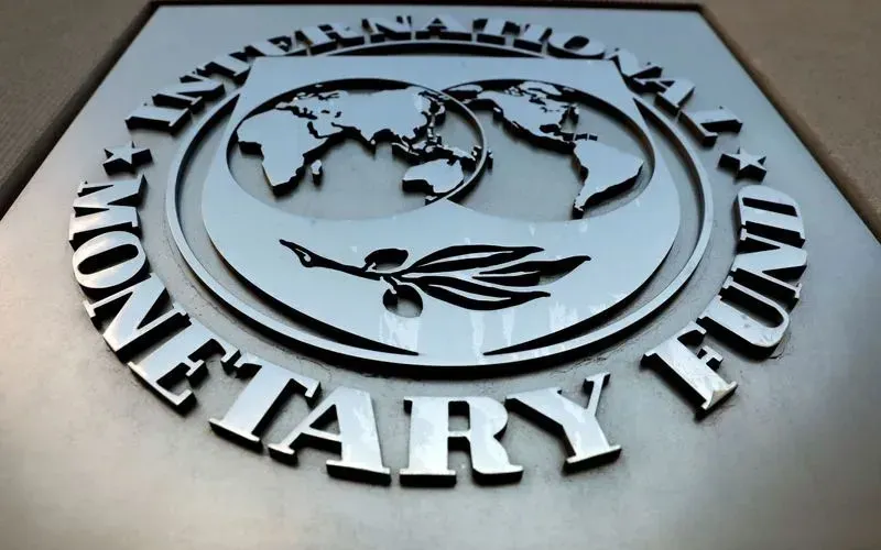 The IMF logo is seen outside the headquarters building in Washington. Credit: IMF
