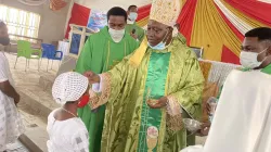 Archbishop Ignatius Kaigama if Abuja in Nigeria administering the Sacrament of Confirmation at St. Francis Parish in Pegi, northern Nigeria. / Archbishop Ignatius A. Kigama Facebook page.