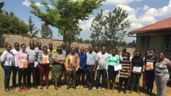 A section of prison officers in charge of juvenile correctional facilities in Kenya pose for a photo session after completing a training by the African Jesuit AIDS Network (AJAN) at Kamiti Maximum Prison. Credit: African Jesuit AIDS Network