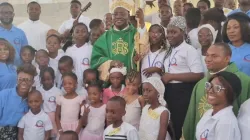 Archbishop Ignatius Ayau Kaigama with some parishioners of St. Mary’s Kary Parish of Abuja Archdiocese