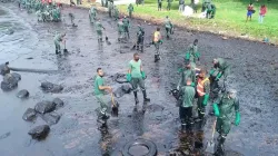 A clean-up crew confronting the oil spill in Riviere des Creoles in Mauritius. Thick muck has inundated Mauritius' unspoiled lagoons, marine habitats and beaches.