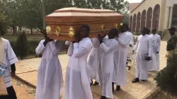 Seminarians carry the coffin of their colleague Michael Nnadi during his burial on 11 February 2020/ Aid to the Church in Need