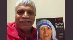 Patrick Norton pictured with a magazine cover of Mother Teresa, who picked him up from the streets of Bombay as an infant. Later he was adopted by an American family. | Credit: Photo courtesy of Patrick Norton