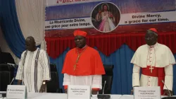 Dieudonne Cardinal Nzapalainga (Center), Philippe Cardinal Ouedraogo (Right), Simeon Sawado (Left), observing a minute of Silence for the victims  of terrorism in Burkina Faso, during the Opening Ceremony of the 4th Pan-African Congress on Divine Mercy in Ouagadougou on November 19, 2019 / ACI Africa