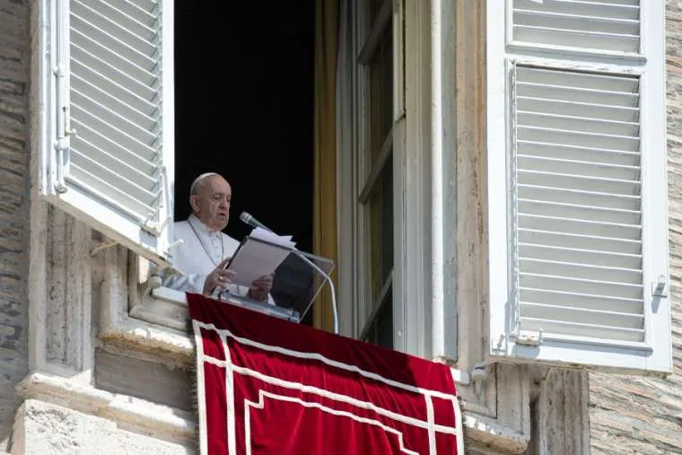 Pope Francis waves from his window overlooking St. Peter’s Square during an Angelus address. / Vatican Media.