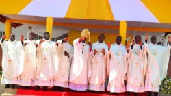 Archbishop Maurice Muhatia Makumba of Kisumu Archdiocese in Kenya posing for a photo with the newly ordained Priests on Saturday, 18 November 2023. Credit: Radio Maria Kisumu