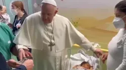 Pope Francis baptizes a baby at Gemelli Hospital in Rome on March 31, 2023. | Credit: Screen shot of Vatican Media video
