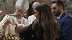 Pope Francis baptizes a child in the Sistine Chapel on Jan. 12, 2020. Credit: Vatican Media.