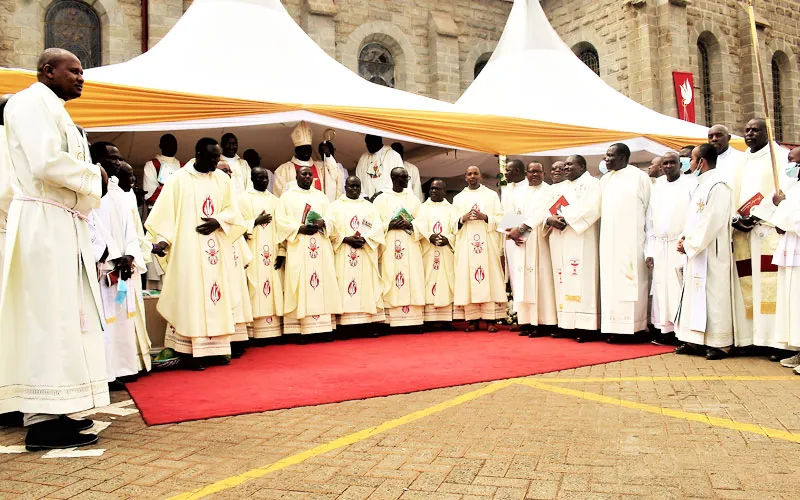 Archbishop Philip Subira Anyolo poses for a photo with Priests after the ordination Mass. Credit: ACI Africa.