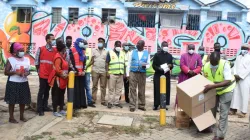 Religious leaders are joined by Red Cross officials for Covid-19 Sensitization exercise and distribution of masks and sanitizers at Kongowea Market in Mombasa. Credit: Archdiocese of Mombasa