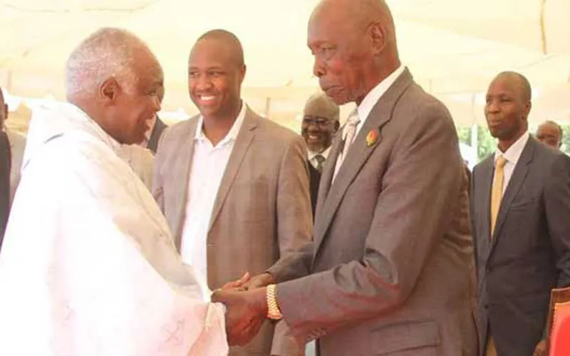 Kenya's late former President Daniel Moi (right) greeting the former Catholic Bishop of Eldoret Diocese, the late Cornelius Korir (left)