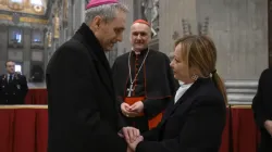 Archbishop Georg Gänswein, the longtime personal secretary of Benedict XVI, greets Italy's Prime Minister, Giorgia Meloni, on Jan. 2, 2023, at St. Peter's Basilica, where Benedict is lying in state. | Vatican Media