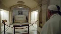 Pope Francis prays at the tomb of Pope Pius XII on Nov. 2, 2021. Vatican Media.