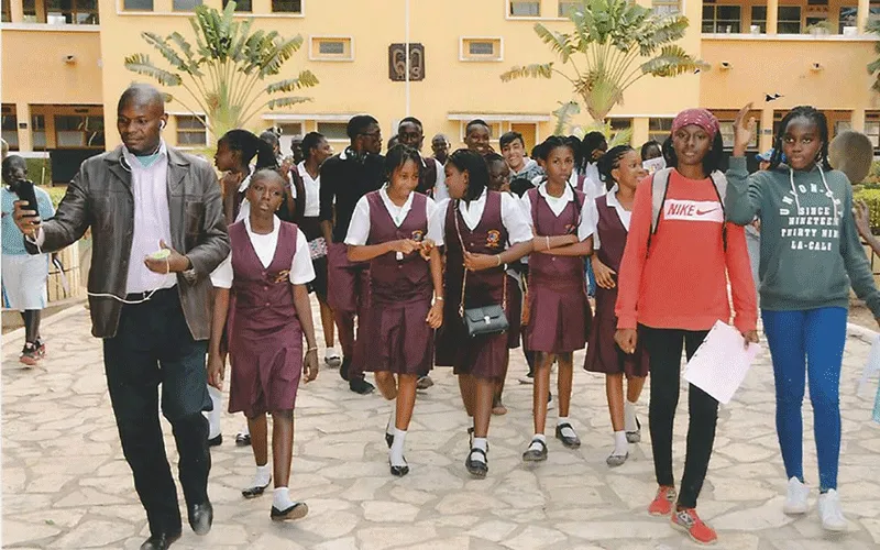 Br. Charles Biagui with students of the Cours Sainte Marie de Hann  in Dakar, Senegal.