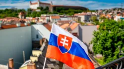 The flag of Slovakia, pictured in the country’s capital, Bratislava. RossHelen via Shutterstock.